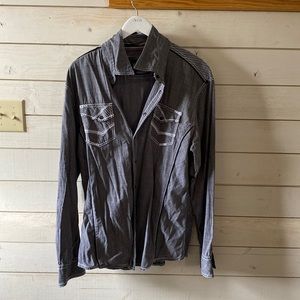 Gray flannel with white stitching on pockets and shoulders